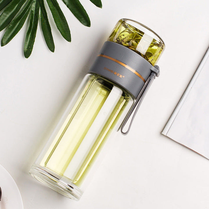 Stay hydrated with this leak-proof double-walled glass water bottle & tea infuser. Hot or cold beverages.