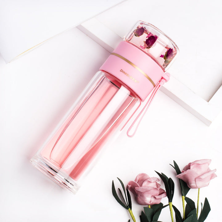 Enjoy hot tea or cold infused water on-the-go with this double-walled glass bottle & tea infuser.
