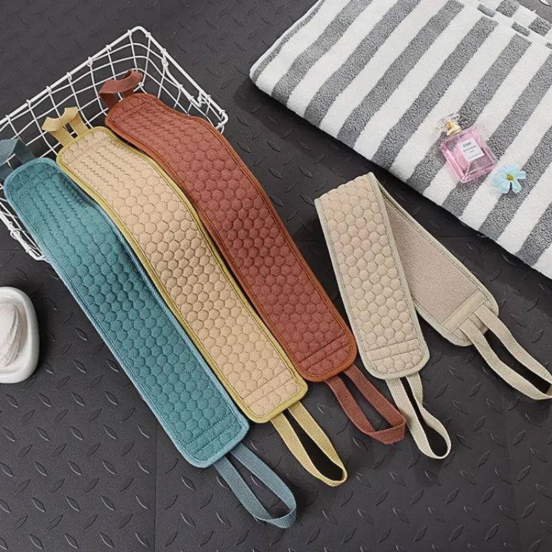 Dual-sided exfoliating back scrubber with soft bristles & textured loofah for effective full body cleansing.