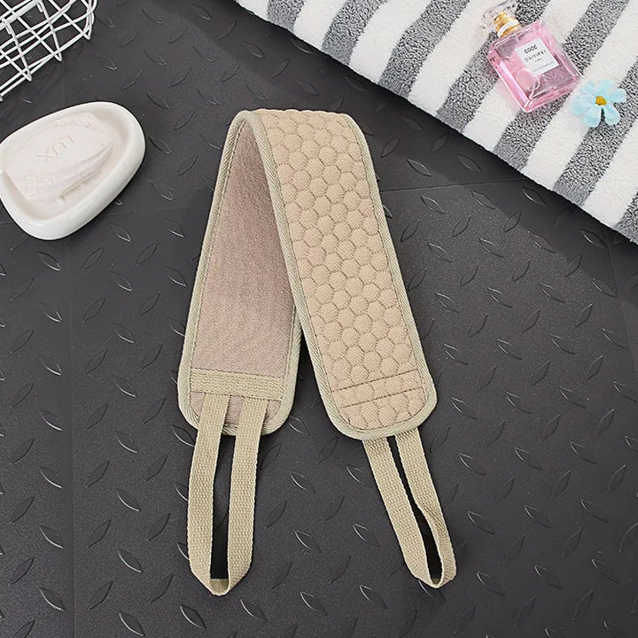Indulge in self-care with this exfoliating back scrubber; deep cleanses, smooths skin, and invigorates your body.