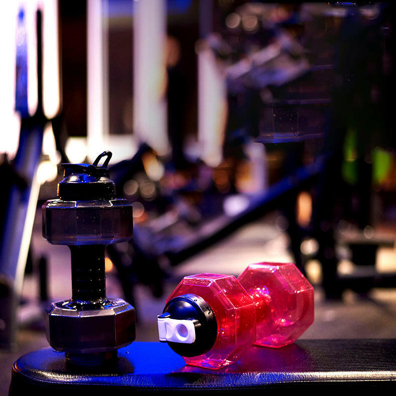 Hydrate and train with this ergonomic dumbbell water bottle, a must-have for fitness routines.