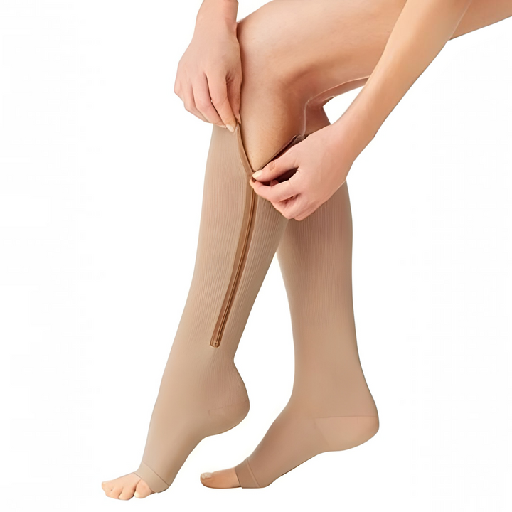Open-toe easy-zip compression socks (20-30 mmHg) provide leg support & circulation for nurses & travelers.