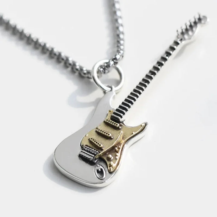 Unisex electric guitar necklace & matching ring jewelry set. Perfect rock and roll accessory for music lovers.