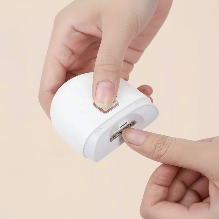 Portable electric nail file kit for home salon use, perfect for shaping & buffing nails.