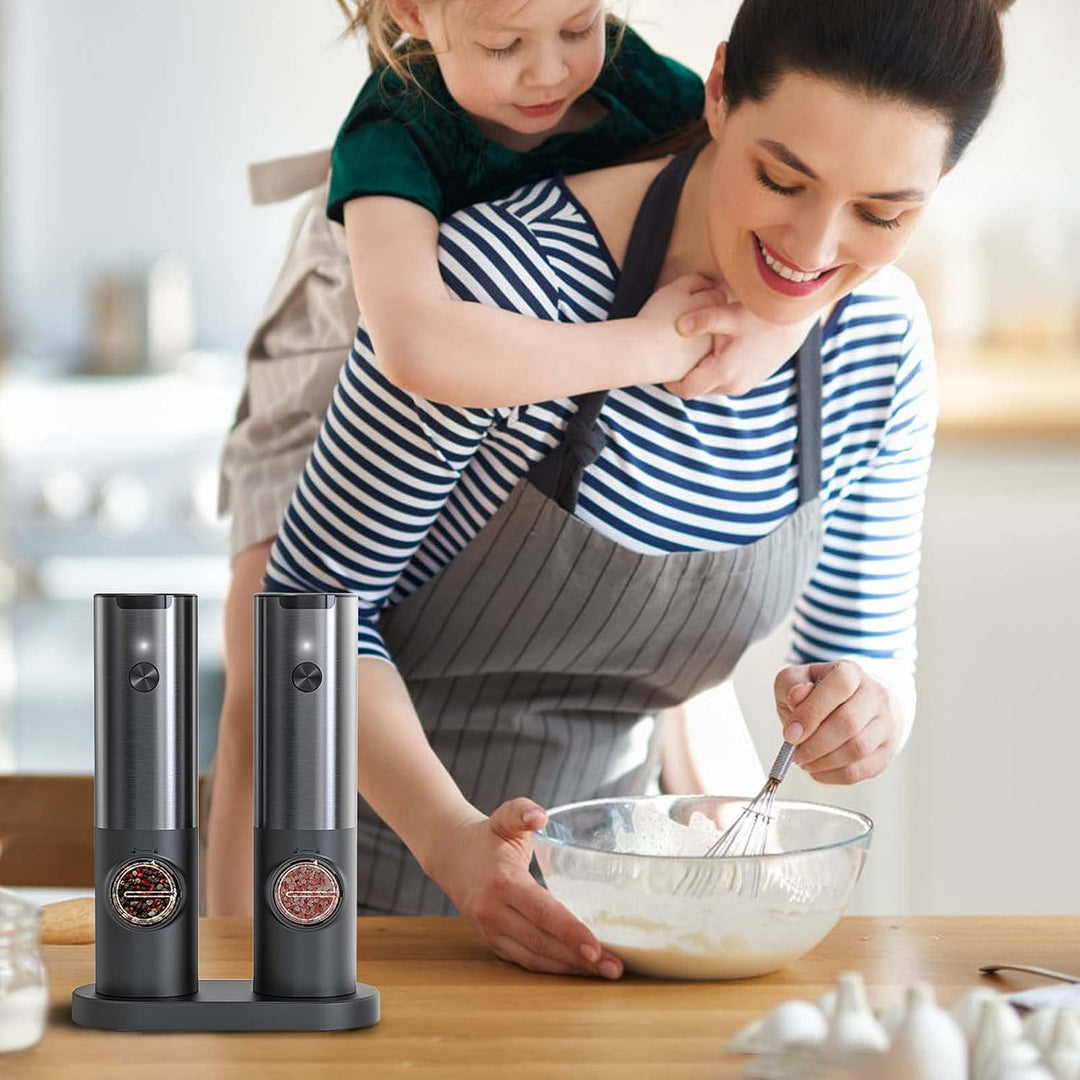 Stylish rechargeable electric pepper & salt grinder set with LED light & adjustable grind. Essential kitchen tool.