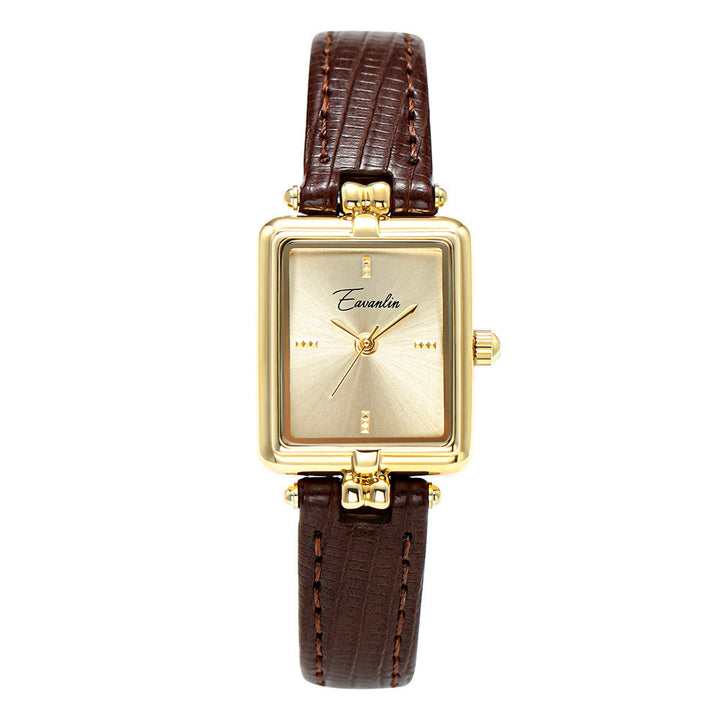 Elegant unisex wristwatch featuring a clean square dial and comfortable faux leather strap. Gold-tone luxury.