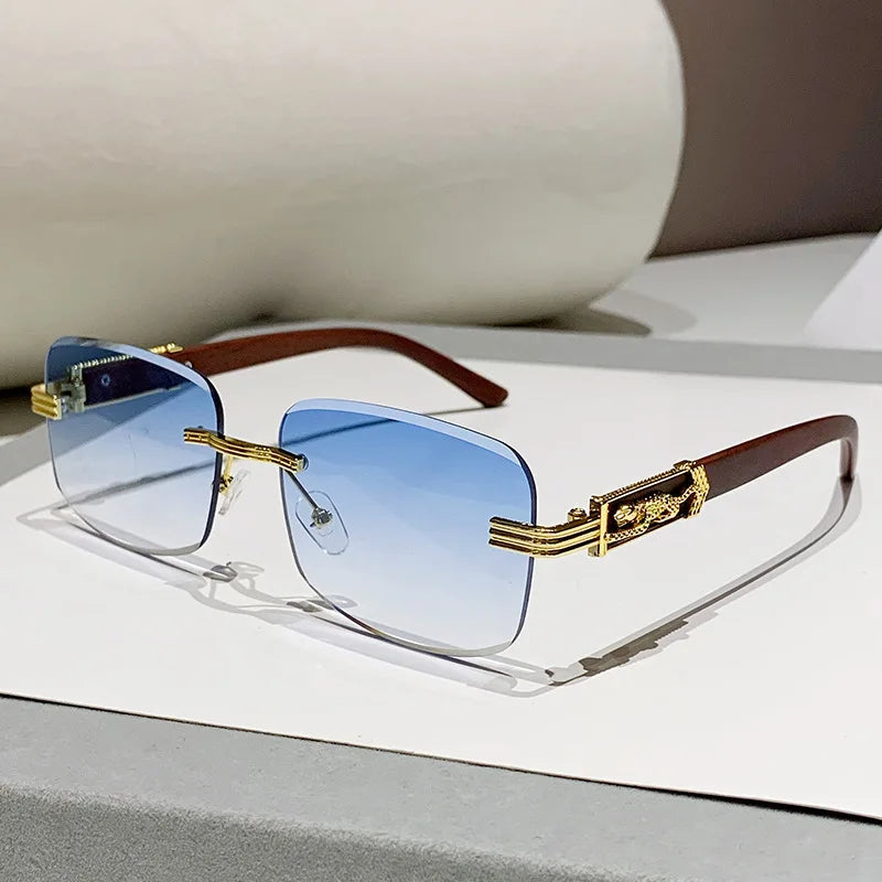 Unisex elegant rimless sunglasses with stylish gradient lenses, a chic fashion accessory for any outfit.