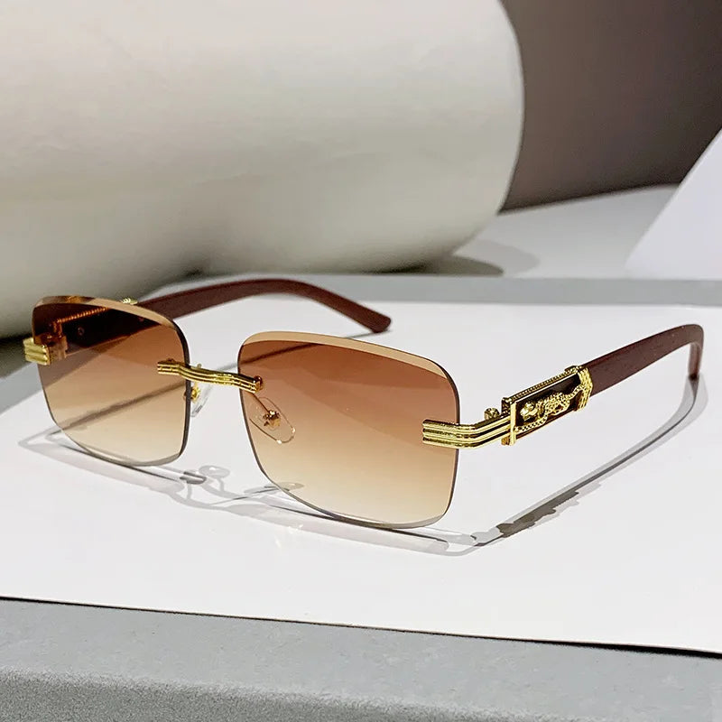 Elegant unisex rimless shades featuring gradient lenses, delicate wood texture arms, and subtle gold accents.