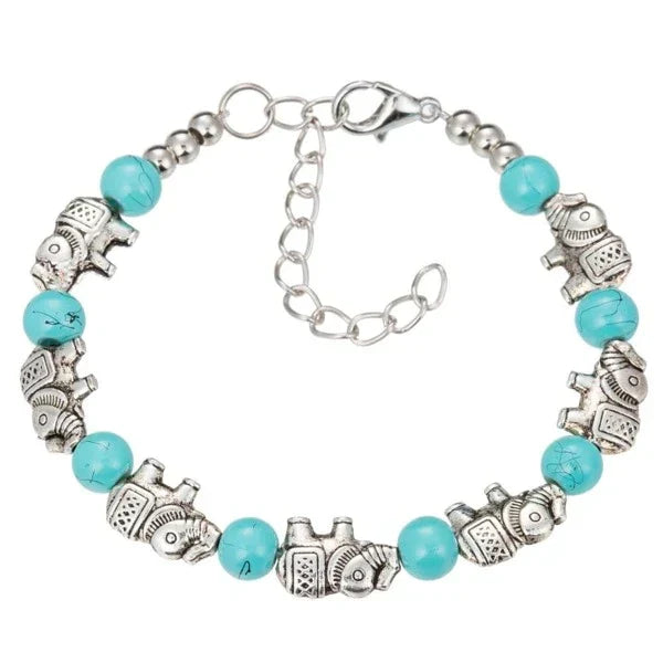 Unisex elephant bracelet with crystal beads & silver charm, handmade boho jewelry, symbolizing wisdom.