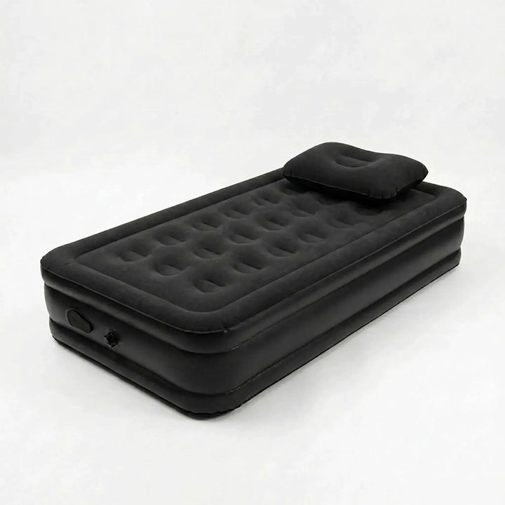 Elevated inflatable bed for camping & hiking. Comfortable single person air mattress in black for outdoor sleep.