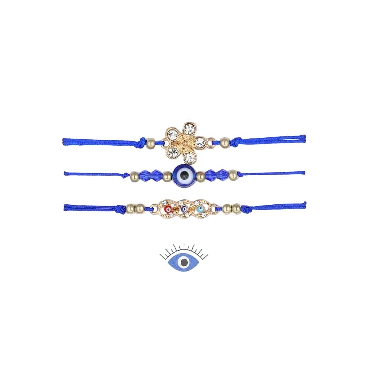 Close-up of a blue Evil Eye charm on an Elif partner bracelet. Handcrafted unisex protection & good luck spiritual jewelry.