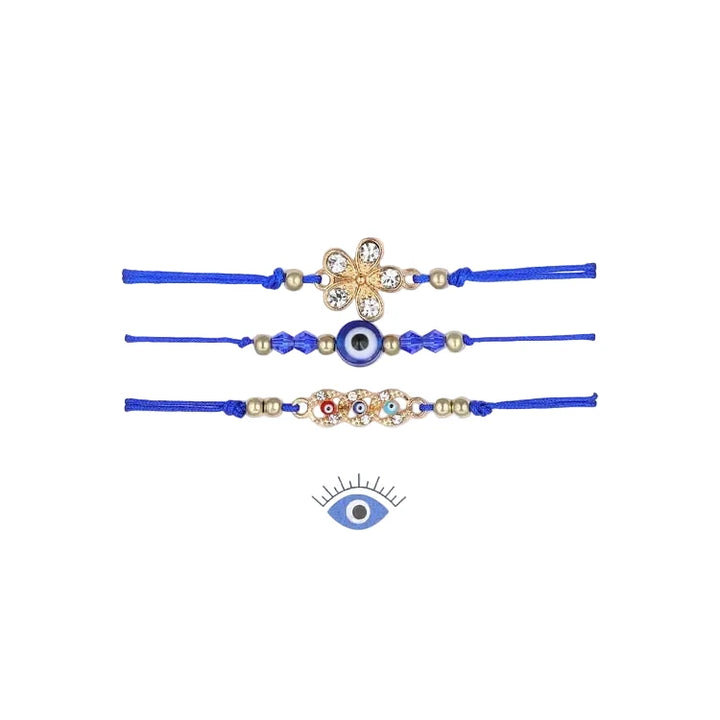 Close-up of a blue Evil Eye charm on an Elif partner bracelet. Handcrafted unisex protection & good luck spiritual jewelry.