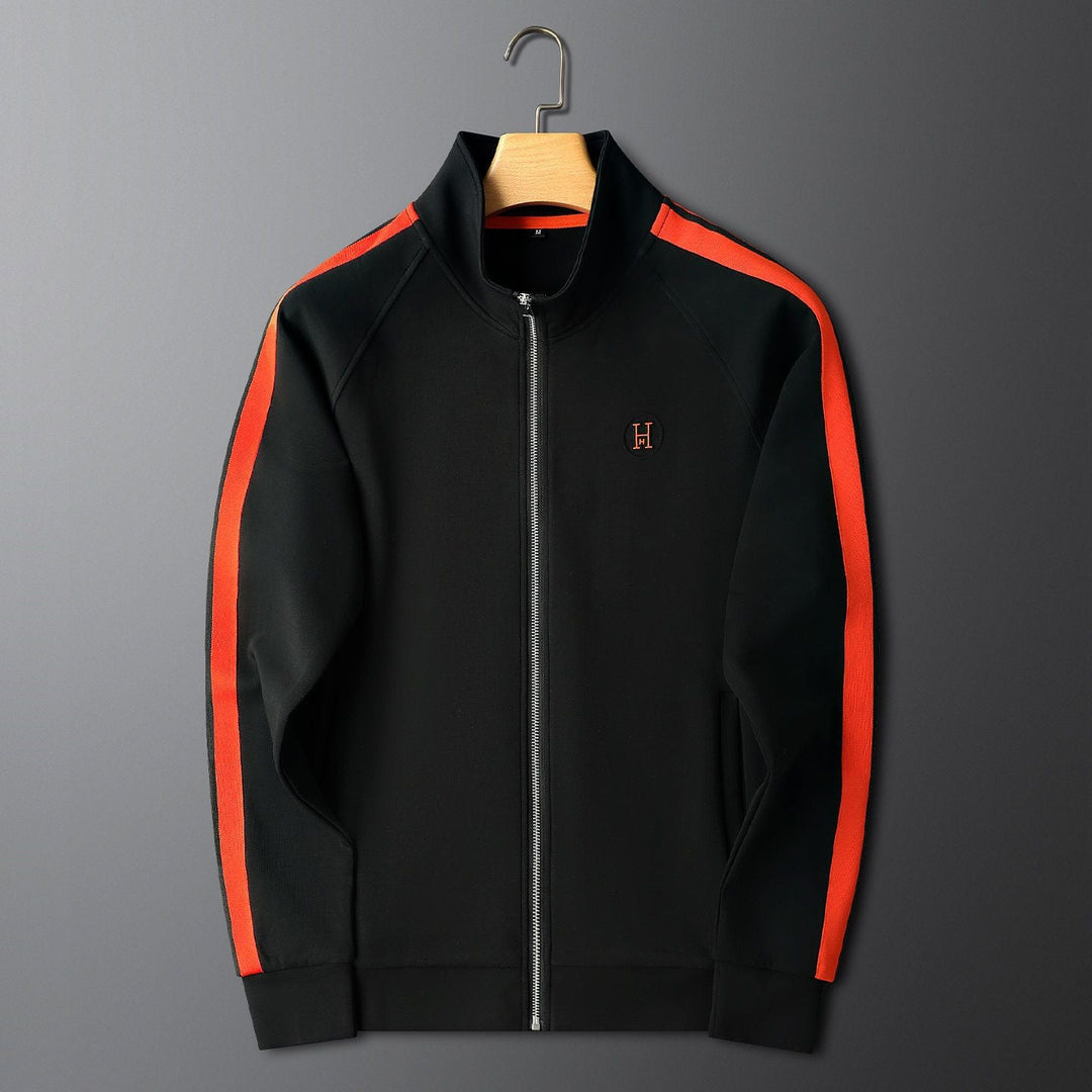 Embroidered unisex tracksuit, combining modern design with athletic comfort. Essential two-piece activewear for any casual fashion look.