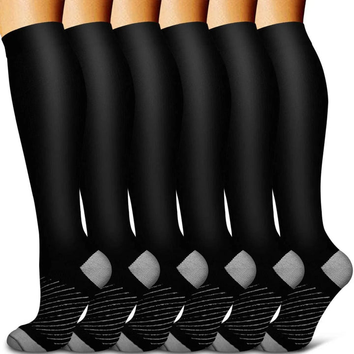 Unisex energizing compression socks for all-day leg support, promoting circulation & anti-fatigue comfort.