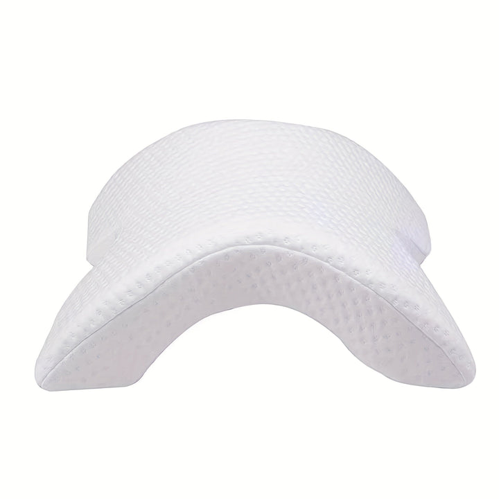 Curved memory foam pillow ergonomically designed for superior neck & arm support, ideal for naps.