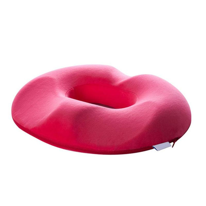 Unisex ergonomic donut cushion on an office chair, providing tailbone & posture support