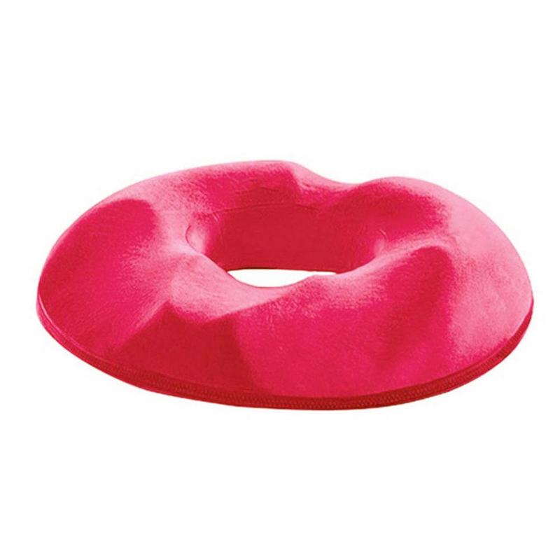Close-up of breathable fabric cover on memory foam donut seat cushion for comfort