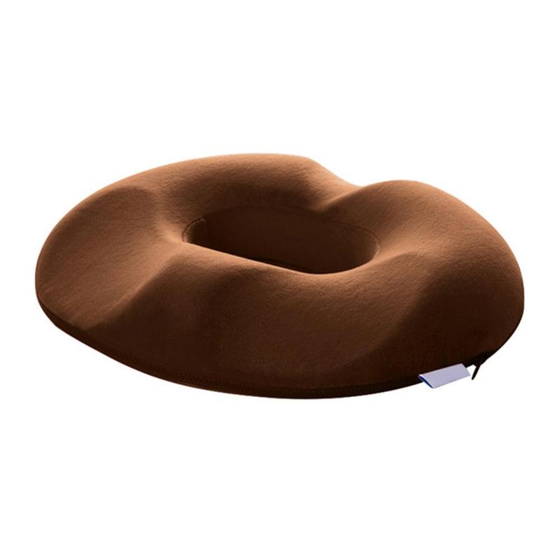 Grey ergonomic memory foam donut cushion, offering comfort and support for long sitting hours