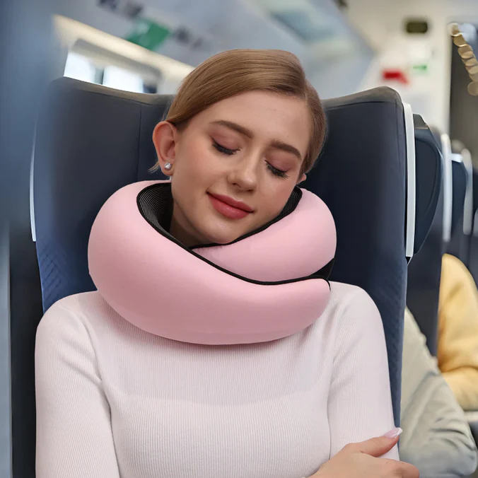 Unisex ergonomic travel neck pillow for comfortable airplane and car journeys, offering excellent neck support & relaxation.