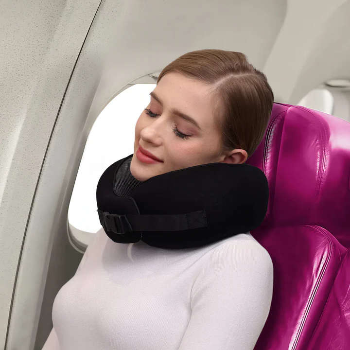 Essential unisex travel neck pillow, providing ergonomic neck support and comfort for relaxing airplane and car journeys.
