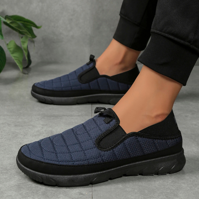 Unisex slip-on comfort walkers with water-resistant quilted upper. Ideal for daily casual wear.