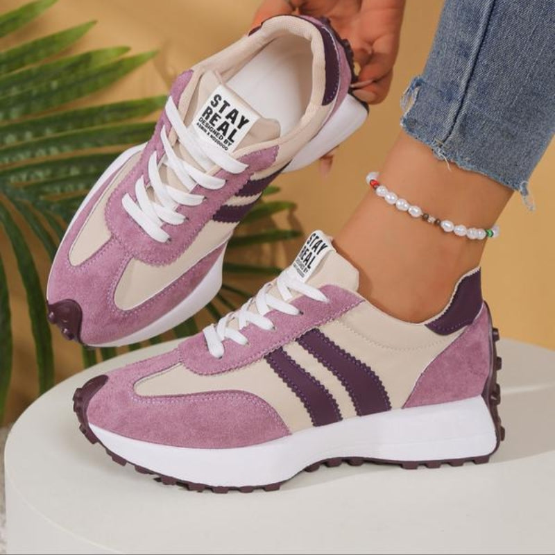 Comfortable unisex athletic walking shoes with a platform sole and advanced arch support system.