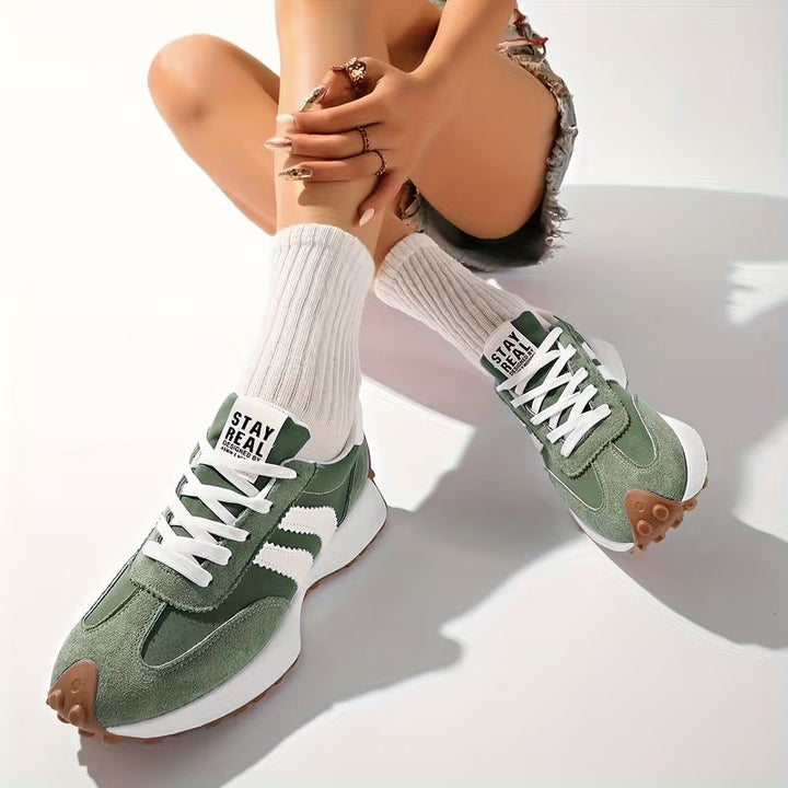 Breathable athletic shoes for men & women, featuring a supportive arch and long-lasting comfort.