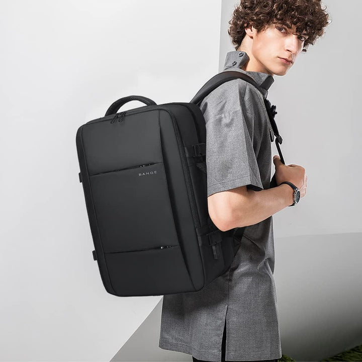 Grey expandable carry-on duffle backpack, offering 26L to 45L storage.
