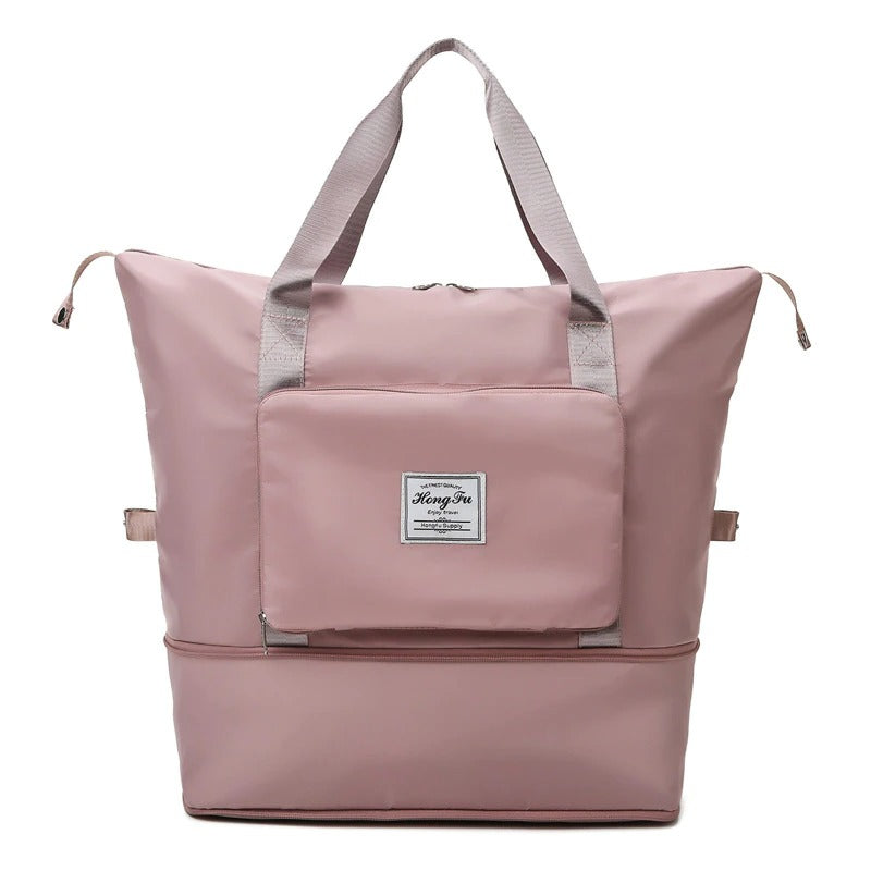 Versatile unisex weekender bag, ideal for short trips and carry-on needs.