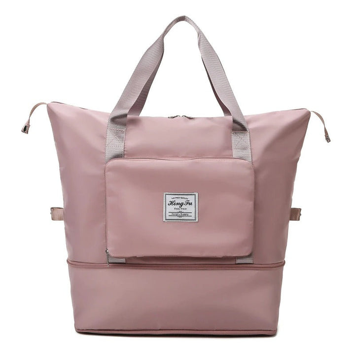 Versatile unisex weekender bag, ideal for short trips and carry-on needs.
