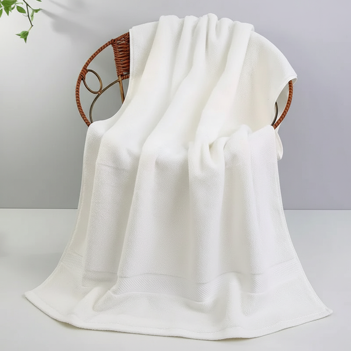 Luxurious extra large royal blue quick-dry cotton bath towel, ideal for home and spa