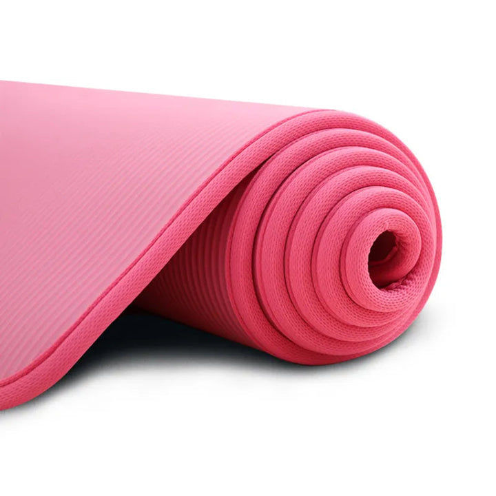 Durable unisex extra thick yoga mat, ideal for studio or home gym, provides joint support for all fitness levels.