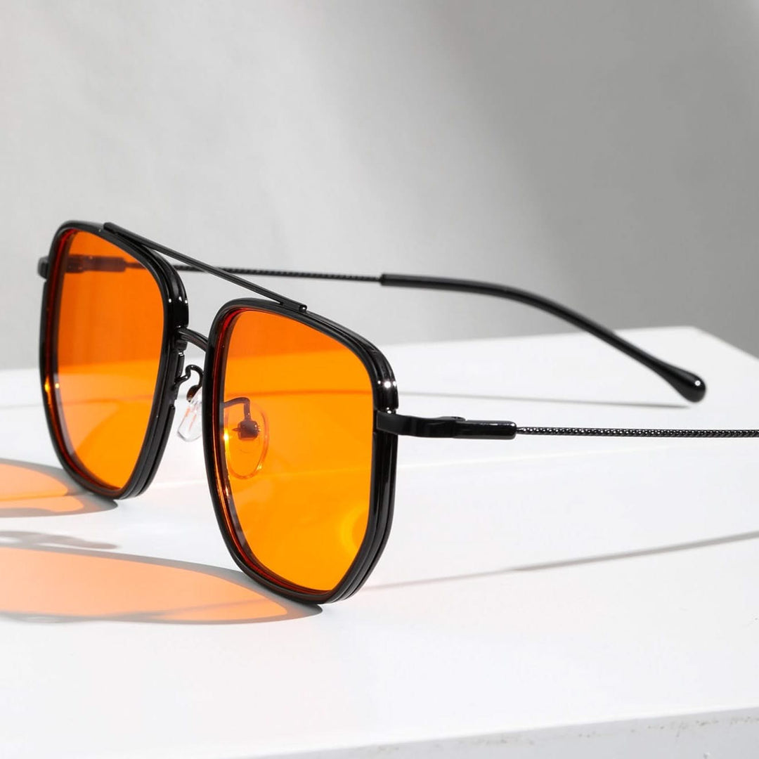 Unisex fashion eyewear with sunset lenses, full UV protection, durable metal frame, and stylish design.