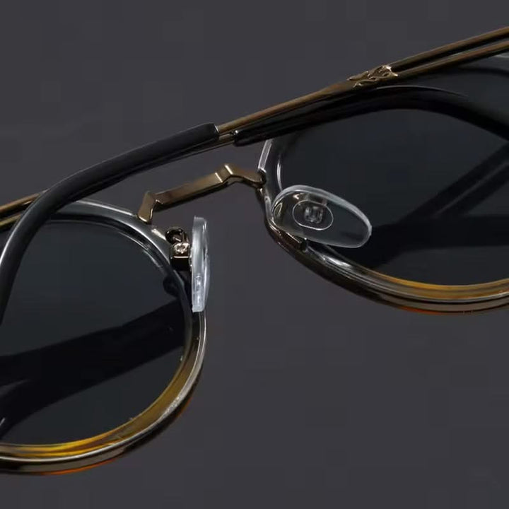 Durable unisex shades with lightweight metal frames, UV protection, and anti-glare lenses.