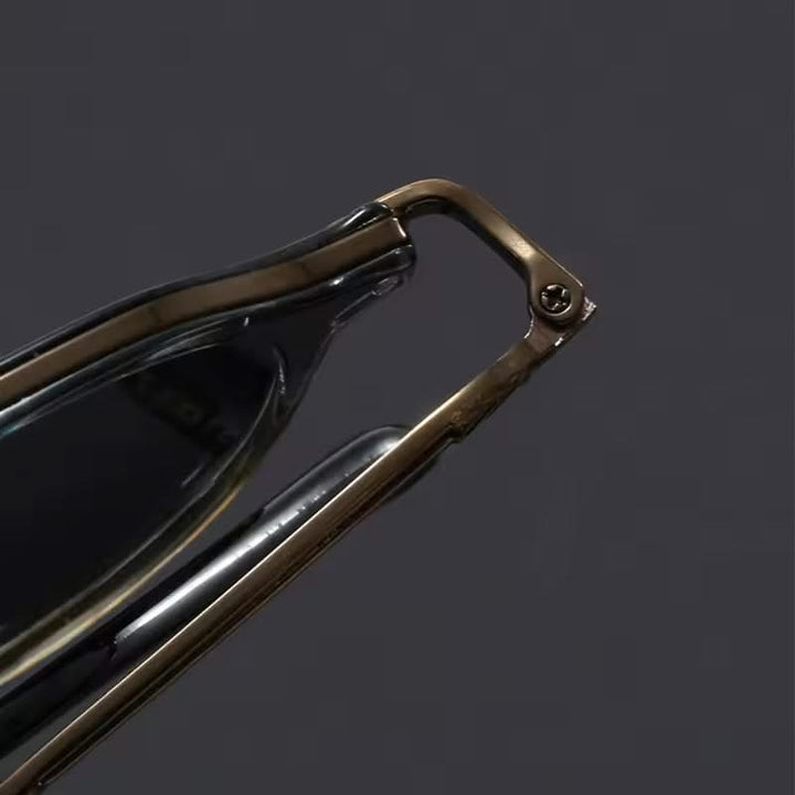 Sleek unisex metal frame sunglasses with advanced UV protection and comfortable fit.