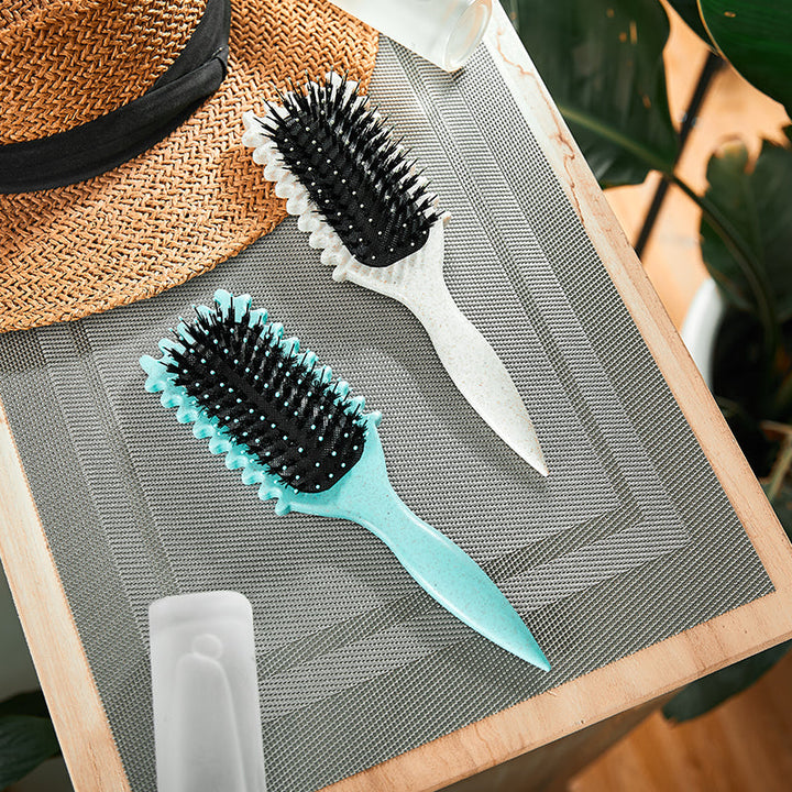 Professional vent hair brush for smooth, frizz-free, fast-drying hair styling.
