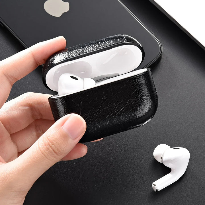 Durable unisex faux leather AirPods case, providing secure and protective cover for earbuds.