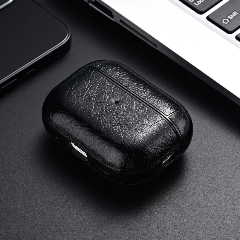Close-up of a faux leather AirPods protective case, showcasing its texture and quality.