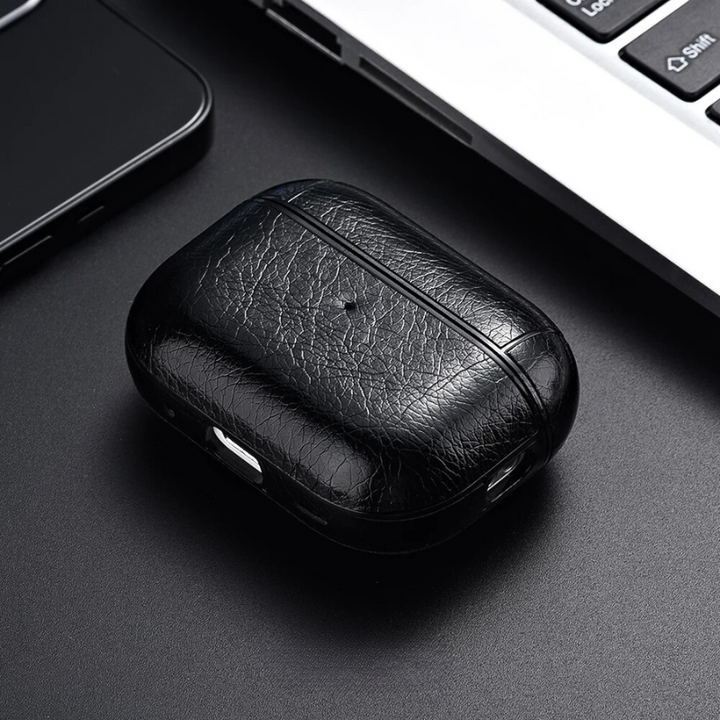 Close-up of a faux leather AirPods protective case, showcasing its texture and quality.