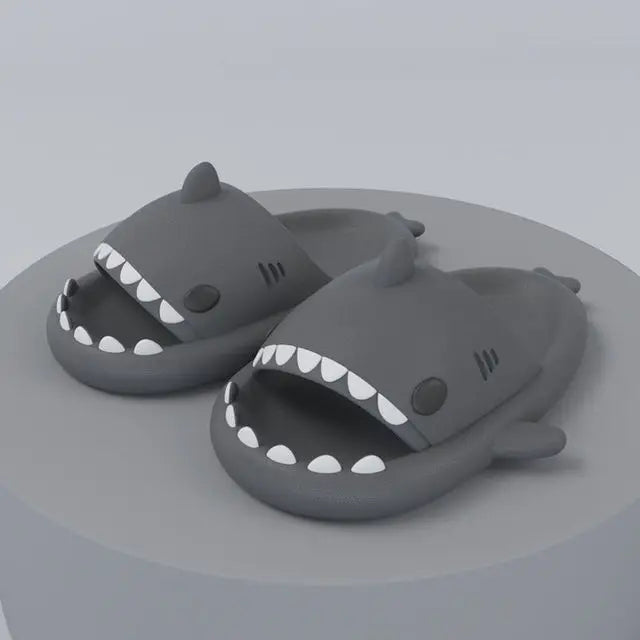 Side view of FinSteps shark design flip flop, highlighting ergonomic lightweight sole and fun shark fin.