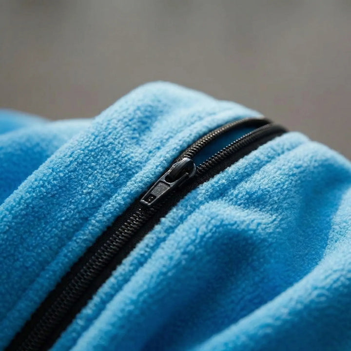 Soft fleece envelope sleeping bag for unisex outdoor camping & travel. A lightweight, packable 3-season liner.