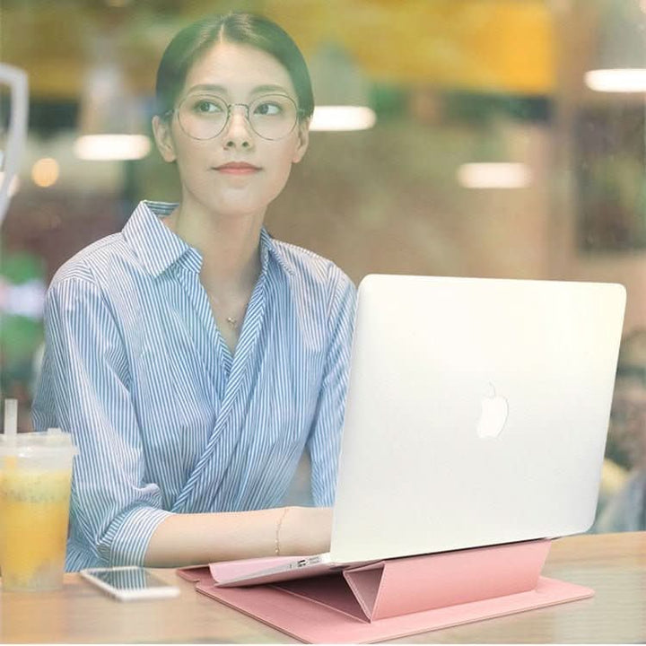 Travel-friendly laptop sleeve with a built-in stand, offering robust device protection.