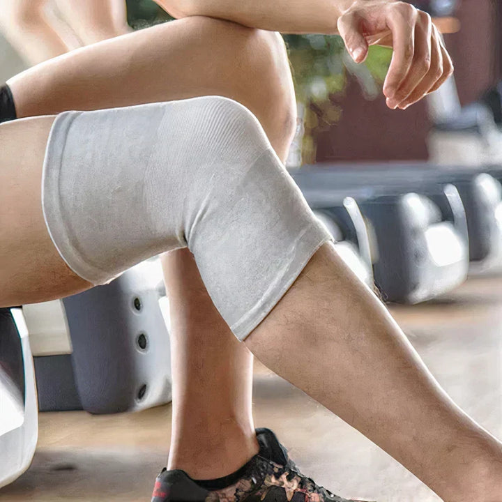 Person wearing FlexiKnee knee support brace for discreet comfort & enhanced joint stability during activities. Pain relief.