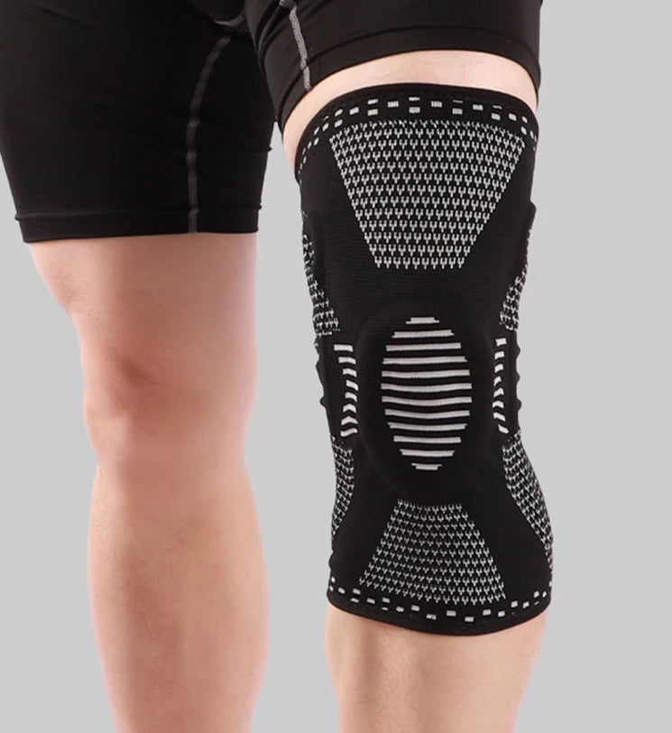 Athletic knee support brace on a moving leg, offering stability & pain relief during sports, rehabilitation & exercise.