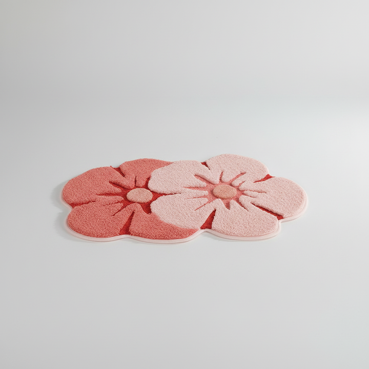Elegant floral bath mat, highly absorbent and non-slip, essential bathroom decor.