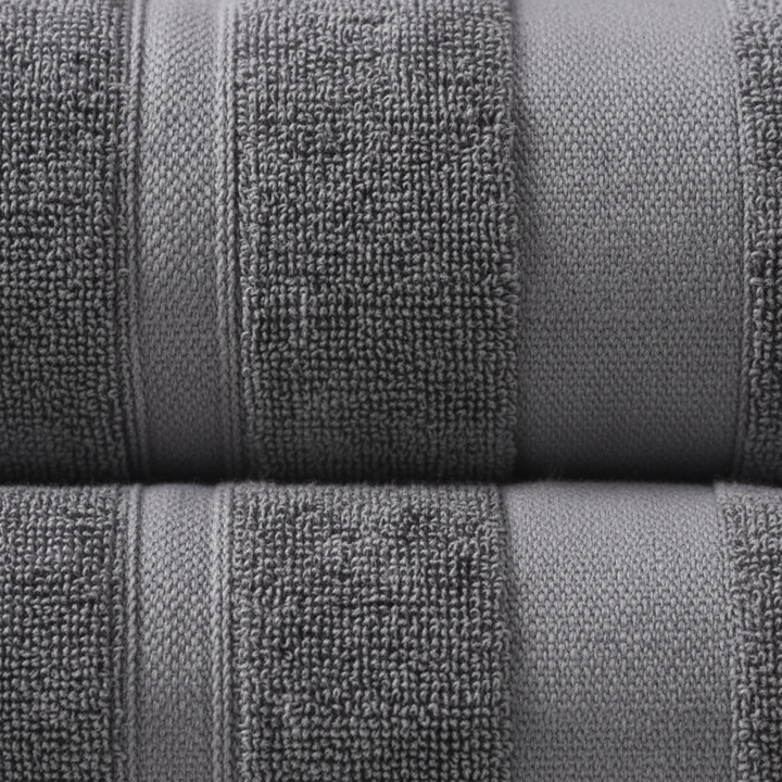 Close-up of a soft and fluffy cotton terry bath towel from the unisex towel set, high-quality home decor