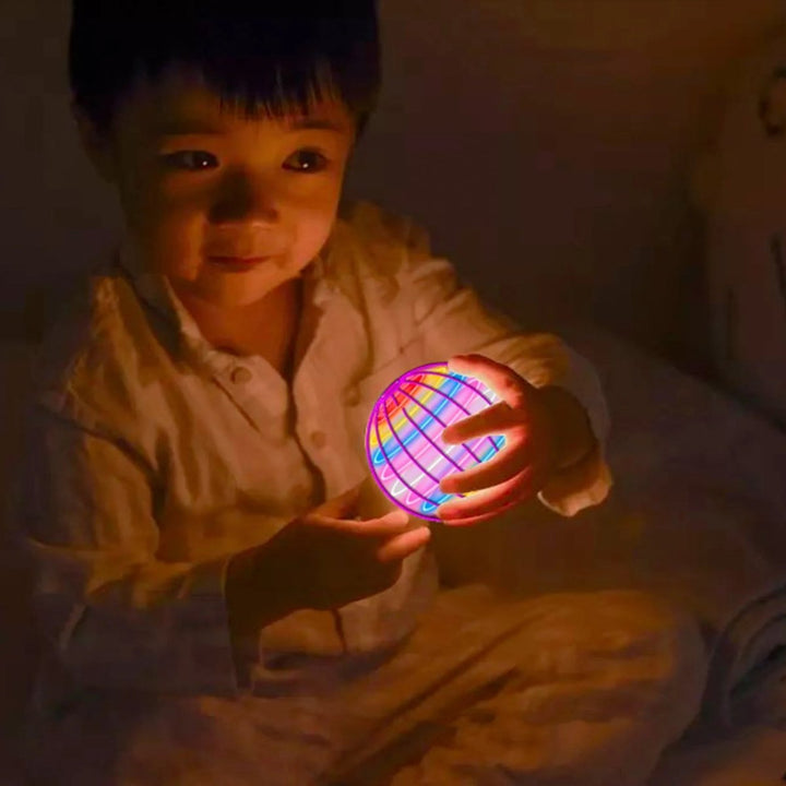 Fun interactive flying gyroscope toy with LED lights, a safe drone alternative for kids & adults.