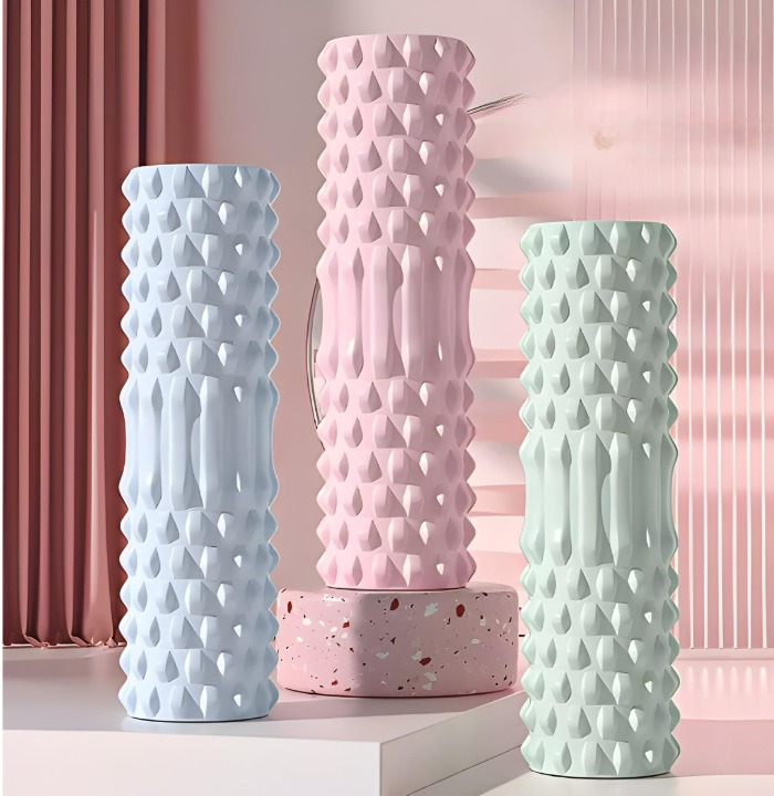 Unisex foam massage roller for muscle relief, recovery, and deep tissue massage.