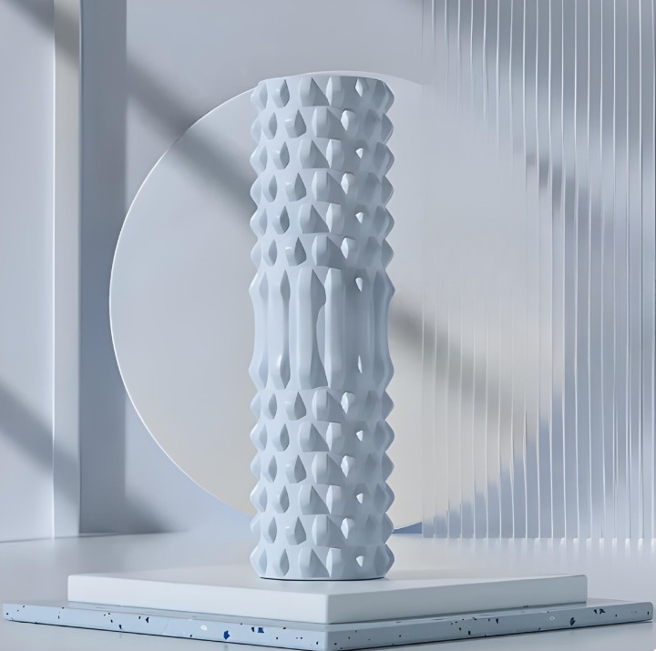 Ergonomic foam roller for back, leg, and neck muscle tension relief and recovery.