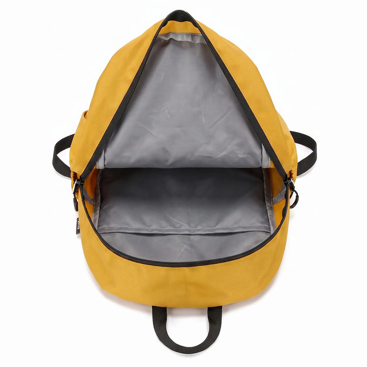 Man wearing a lightweight unisex hiking backpack on a trail, perfect for day hikes.